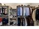 Well-organized closet with shelves, hanging rods, and ample storage for clothes and accessories at 445 Panoramic Dr, Monument, CO 80132