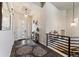 Inviting home entryway featuring high ceilings, modern lighting, and stylish accents, perfect for welcoming guests at 445 Panoramic Dr, Monument, CO 80132