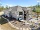 A spacious two-story home with a walkout basement, hot tub, and outdoor patio at 445 Panoramic Dr, Monument, CO 80132
