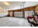 An unfinished garage with multiple bays, offering ample space for parking and storage at 445 Panoramic Dr, Monument, CO 80132