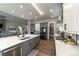 Well-equipped kitchen with stainless appliances, a large island, and plenty of cabinet space for storage at 445 Panoramic Dr, Monument, CO 80132