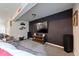 Cozy living room with entertainment center and grey-toned walls, creating a perfect ambiance for movie nights at 445 Panoramic Dr, Monument, CO 80132