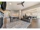 Spacious living room with hardwood floors, a fireplace, an open floor plan and natural light at 445 Panoramic Dr, Monument, CO 80132