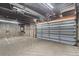 Spacious garage featuring high ceilings, concrete floor, and an electric vehicle charging outlet at 152 S Jackson St, Denver, CO 80209