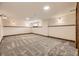 Spacious basement featuring neutral carpet, recessed lighting, and ample room at 1348 E Jamison Ave, Centennial, CO 80122