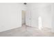 Neutral bedroom offering ample space and natural lighting, featuring white walls and carpet at 23527 E 5Th Pl, Aurora, CO 80018