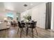 Cozy dining area with stylish table and chairs, and natural light at 23527 E 5Th Pl, Aurora, CO 80018