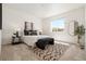 A stylish main bedroom features neutral decor and carpet at 23527 E 5Th Pl, Aurora, CO 80018