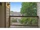 Relaxing outdoor balcony space with lush greenery views, perfect for enjoying fresh air and tranquility at 8775 W Berry Ave # 203, Littleton, CO 80123
