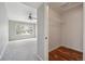 Spacious bedroom with plush carpeting, closet, and ample natural light at 8775 W Berry Ave # 203, Littleton, CO 80123