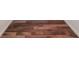 Close-up of beautifully installed wood-look flooring at 8775 W Berry Ave # 203, Littleton, CO 80123