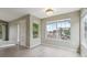 Bright living room with large windows offering an abundance of natural light at 8775 W Berry Ave # 203, Littleton, CO 80123