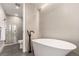 Tranquil bathroom showcasing a freestanding tub and sleek tile design, perfect for relaxation at 1901 Wazee St # 807, Denver, CO 80202