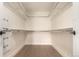 Walk-in closet features custom shelves, hardwood floors, and ample storage space at 1901 Wazee St # 807, Denver, CO 80202