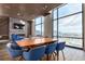 Open-concept dining area with city views, modern decor, and large windows at 1901 Wazee St # 807, Denver, CO 80202