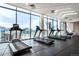 Gym featuring treadmills, floor to ceiling windows, and cityscape views at 1901 Wazee St # 807, Denver, CO 80202