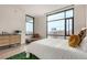 Serene main bedroom with large windows offering city views and a cozy aesthetic at 1901 Wazee St # 807, Denver, CO 80202