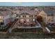 Aerial view of a two-story house with a large deck and hot tub at 10918 Bellbrook Cir, Highlands Ranch, CO 80130