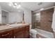 Basement bathroom with shower and tiled flooring at 10918 Bellbrook Cir, Highlands Ranch, CO 80130