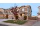 Two-story house with landscaped yard and attached two-car garage at 10918 Bellbrook Cir, Highlands Ranch, CO 80130