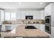 Modern kitchen with granite countertops and stainless steel appliances at 10918 Bellbrook Cir, Highlands Ranch, CO 80130