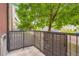 Balcony with concrete floor and metal railing at 5201 S Fox St # 102, Littleton, CO 80120