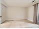 This is a bright bedroom with neutral carpet, paint and natural light at 5201 S Fox St # 102, Littleton, CO 80120
