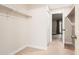 Walk-in closet with built in shelving and rod for storage at 5201 S Fox St # 102, Littleton, CO 80120