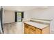 Kitchen featuring a breakfast bar overlooking the living area with natural light at 5201 S Fox St # 102, Littleton, CO 80120
