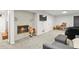 Finished basement featuring a decorative fireplace, carpet flooring and space to watch TV at 4040 Cody St, Wheat Ridge, CO 80033