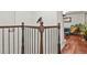 Hallway with beautiful wood railing and floors leading to other areas of the home at 4040 Cody St, Wheat Ridge, CO 80033