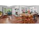 Open concept living room, fireplace, dining area, and hardwood floors throughout at 4040 Cody St, Wheat Ridge, CO 80033