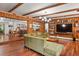 Inviting living room with wood floors, exposed beams, and an open layout perfect for entertaining at 4040 Cody St, Wheat Ridge, CO 80033