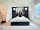 Serene primary bedroom with a modern aesthetic and large windows offering scenic views at 5027 N Walden Way, Denver, CO 80249