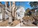 Cozy townhouse exterior with a well-maintained front yard at 8867 W Floyd Ave, Lakewood, CO 80227