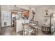 Bright kitchen features stainless steel appliances and an eat-in area at 8867 W Floyd Ave, Lakewood, CO 80227