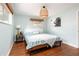 Spacious bedroom with hardwood floors and calming decor at 5080 S Inca Dr, Englewood, CO 80110