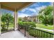 Charming balcony view of community landscaping with mature trees and walking path at 6222 Kilmer Loop # 103, Golden, CO 80403