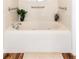 Well-lit bathroom featuring a luxurious soaking tub with jets and grab bars for safety at 6222 Kilmer Loop # 103, Golden, CO 80403