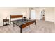Roomy bedroom showcasing plush carpet and easy access to the bathroom and closets at 6222 Kilmer Loop # 103, Golden, CO 80403