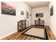 Well-decorated bonus room featuring wood floors, accent rug, and natural light at 6222 Kilmer Loop # 103, Golden, CO 80403