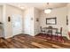Dining space features overhead light and seating, wood-look flooring at 6222 Kilmer Loop # 103, Golden, CO 80403