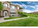 Beautiful townhouse with well-maintained lawn, siding, and stone facade at 6222 Kilmer Loop # 103, Golden, CO 80403