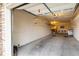 Spacious garage interior with built-in shelving, overhead lighting, and ample storage at 6222 Kilmer Loop # 103, Golden, CO 80403