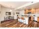 Bright, eat-in kitchen with stainless steel appliances and dining area with decorative rug at 6222 Kilmer Loop # 103, Golden, CO 80403