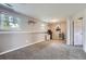 Finished basement featuring carpeted floors, neutral walls, and two windows at 15691 E Atlantic Cir, Aurora, CO 80013