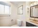 Modern bathroom highlighting a sleek vanity and toilet at 15691 E Atlantic Cir, Aurora, CO 80013