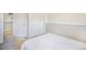 Comfortable bedroom with a plush bed, neutral tones, and natural light at 15691 E Atlantic Cir, Aurora, CO 80013
