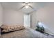 Bedroom features carpeted floors, neutral walls, and a decorative accent wall at 15691 E Atlantic Cir, Aurora, CO 80013