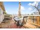 Outdoor deck with a table and chairs, and scenic views at 15691 E Atlantic Cir, Aurora, CO 80013